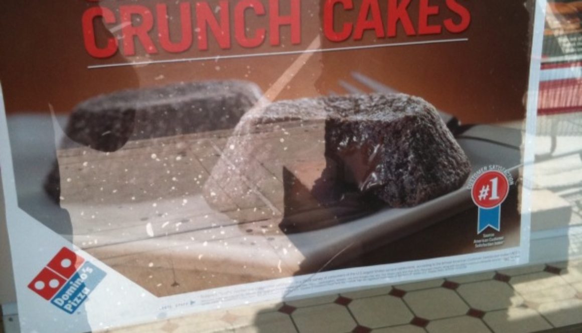 Advertised on the door at Dominos in Kihei. How many chocolate lava cakes do they sell in a day, I wonder?